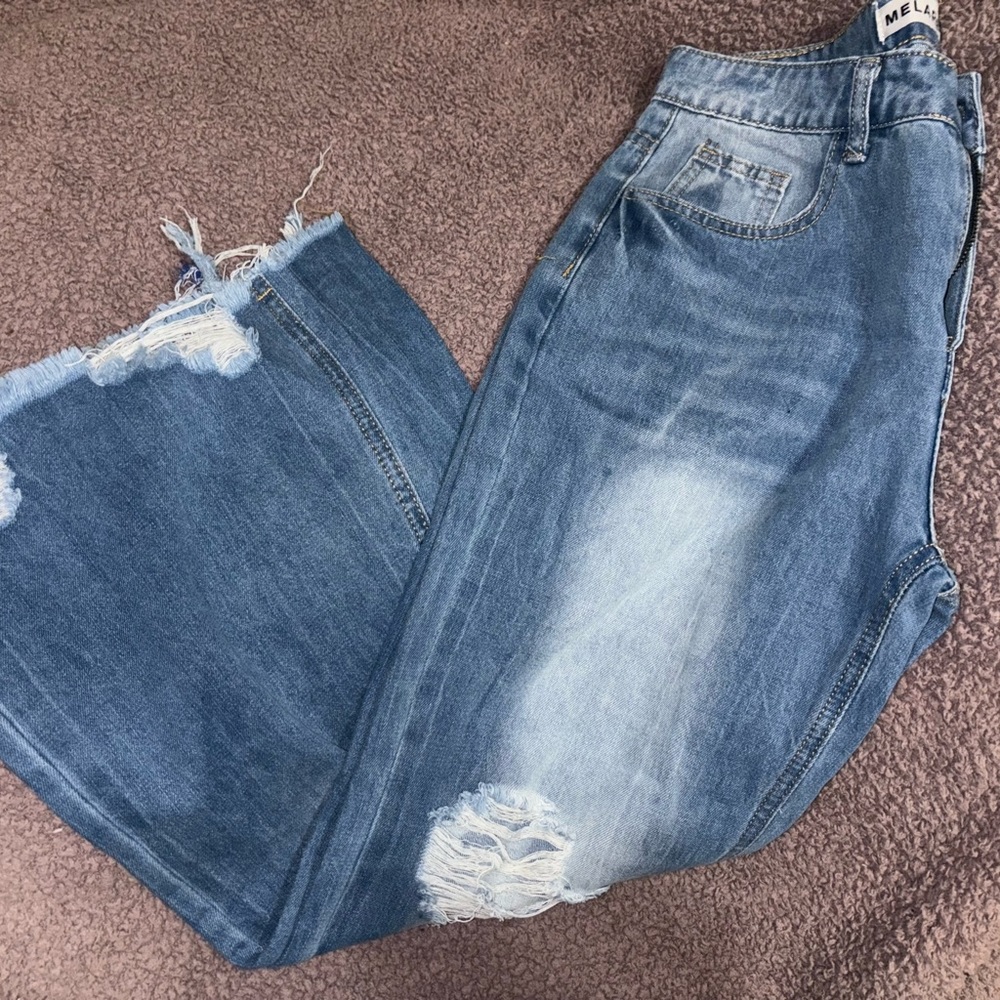 Distressed Blue Jeans